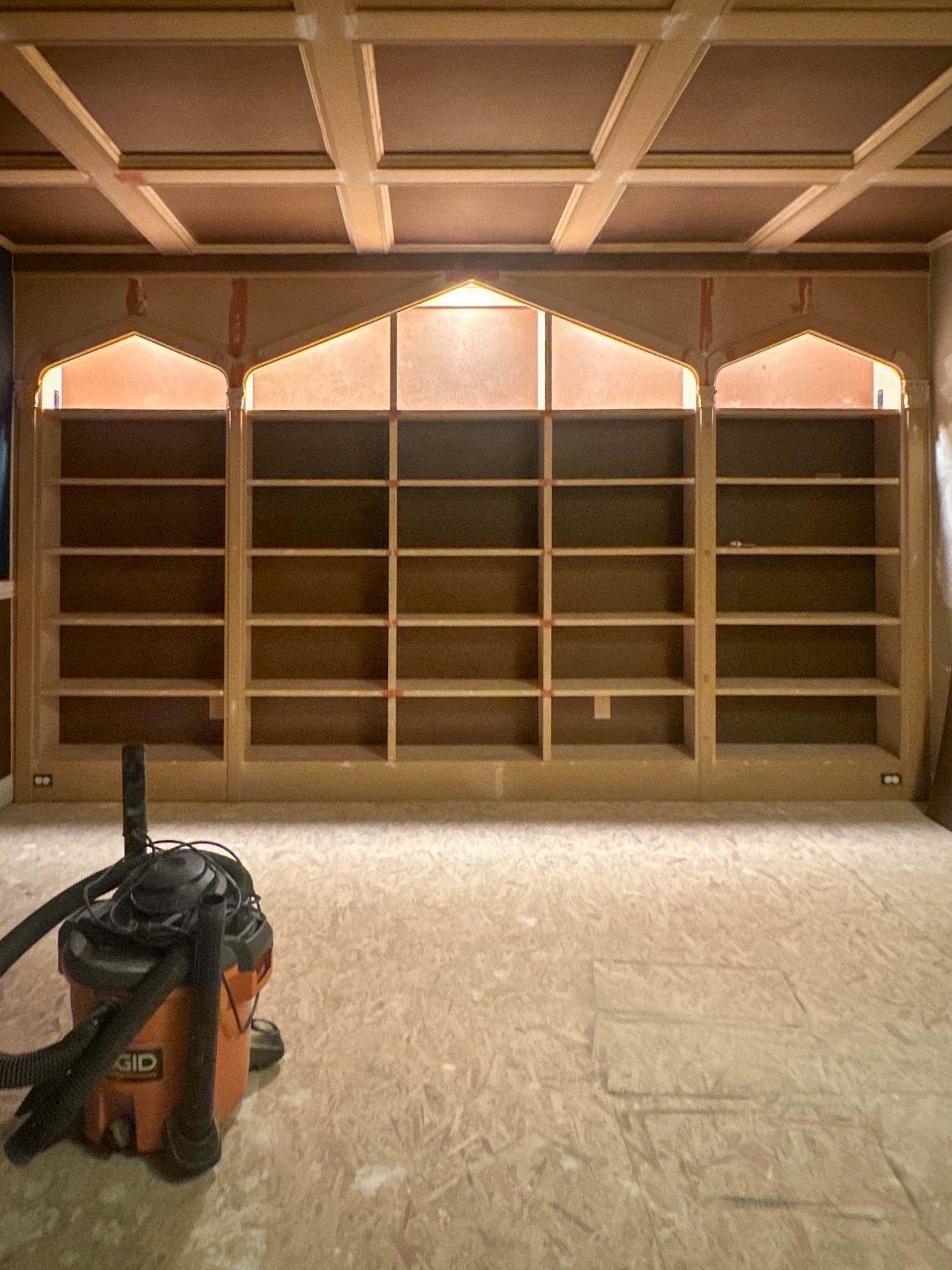 The Great Primer Debate: Dark vs. White Primer on Built-in Bookshelves