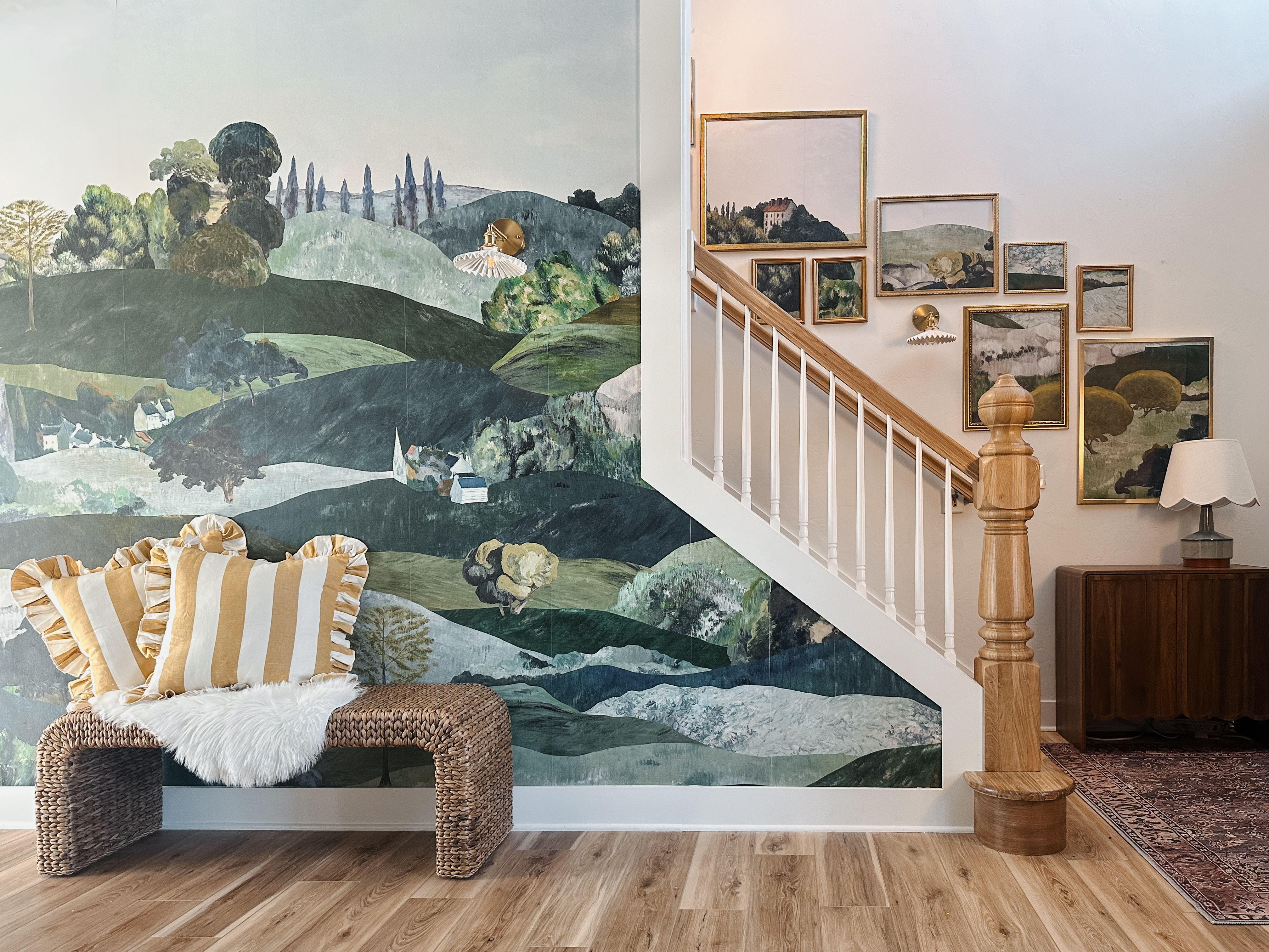 Hanging belarteSTUDIO’s Eclectic Landscape Wallpaper in Our Entry Hallway